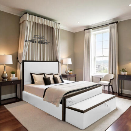 White luxurious upholstered bed with blanket storage box