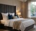 Luxury styled divan bed with upholstered headboard in a modern UK bedroom